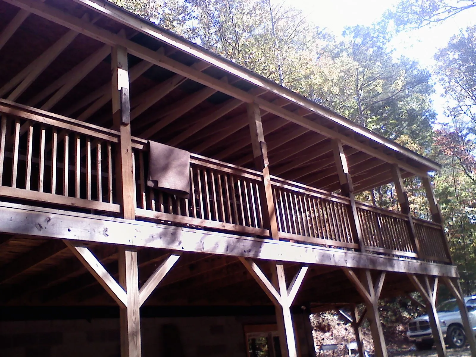 Timber framing under a new elevated porch and deck — Roof Leak Repair in Minden City by Roofing Brothers